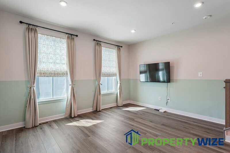 Beautifully upgraded 4-level townhome in Elkridge featuring a rare and modern floor plan property image