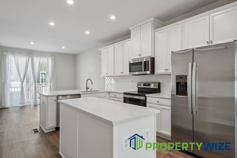 Beautifully upgraded 4-level townhome in Elkridge featuring a rare and modern floor plan property image