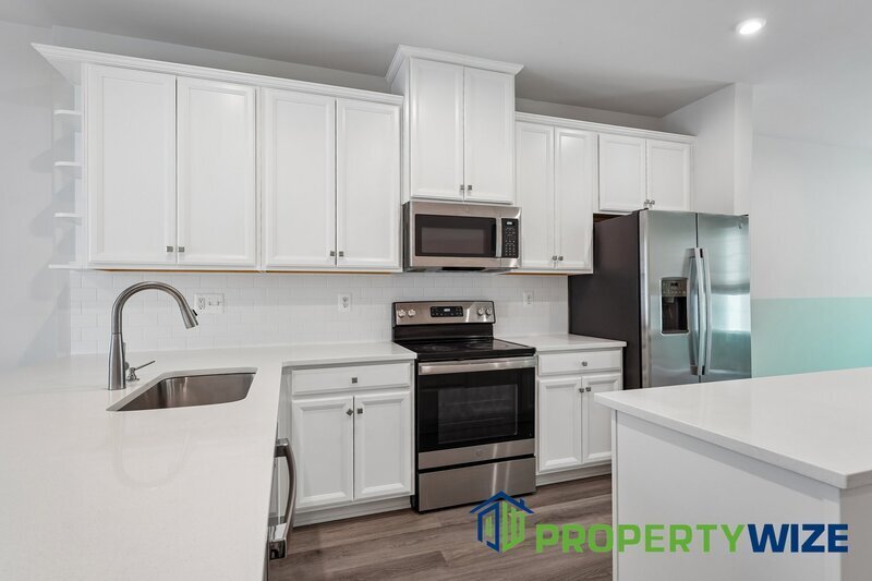 Beautifully upgraded 4-level townhome in Elkridge featuring a rare and modern floor plan property image