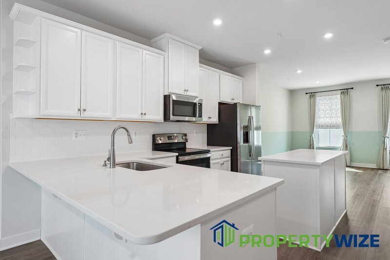 Beautifully upgraded 4-level townhome in Elkridge featuring a rare and modern floor plan property image