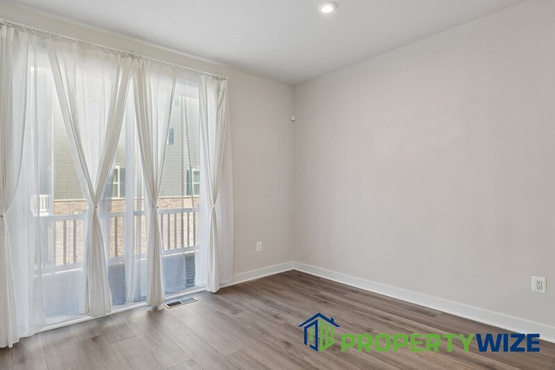 Beautifully upgraded 4-level townhome in Elkridge featuring a rare and modern floor plan property image