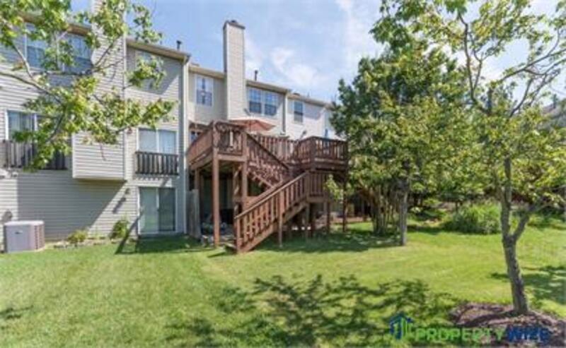 Natural light fills this Woodland Village home! Features garage parking, master suite, updated 2 full baths at top floor and powder room at 1st floor. property image