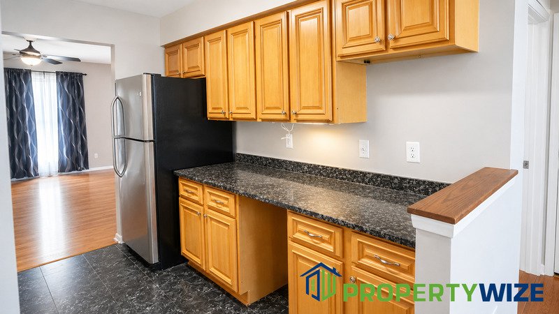 Natural light fills this Woodland Village home! Features garage parking, master suite, updated 2 full baths at top floor and powder room at 1st floor. property image