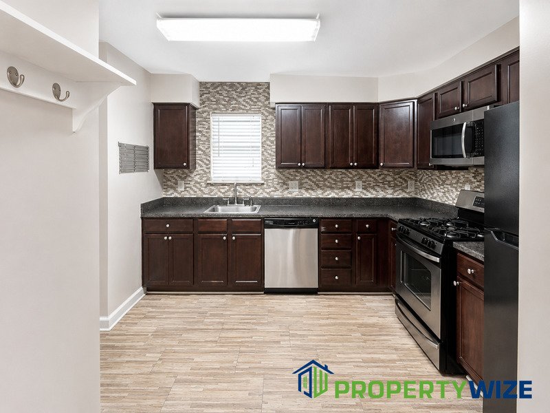This renovated 3-bedroom, 2-bathroom townhome has all the bells and whistles. property image
