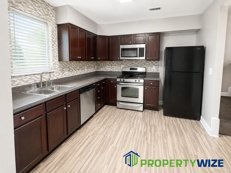 This renovated 3-bedroom, 2-bathroom townhome has all the bells and whistles. property image